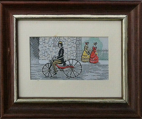 J & J Cash miniature woven picture of a cyclist