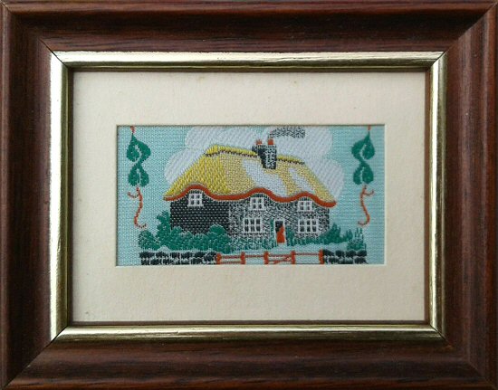 J & J Cash miniature woven picture of a thatched cottage