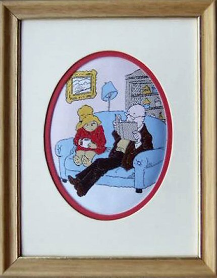 J & J Cash small oval centred woven picture with image of Paddington Bear sat on a settee with a cup of tea