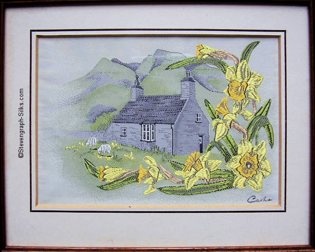 J & J Cash woven picture with no words, but title of Welsh Cottage