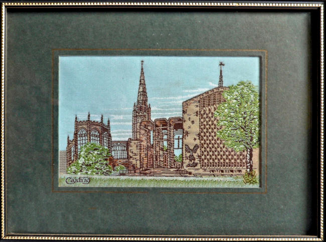 J & J Cash woven picture of Coventry Cathedral, with trees in the foreground