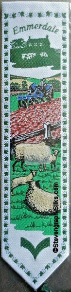 bookmark with Emmerdale title word, and farming landscape