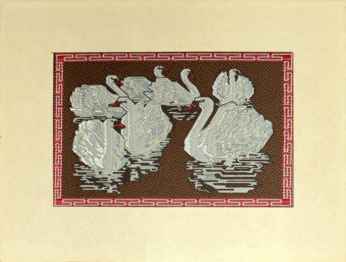 woven picture of a Church Kneeler, with title of Seven Swans a swimming