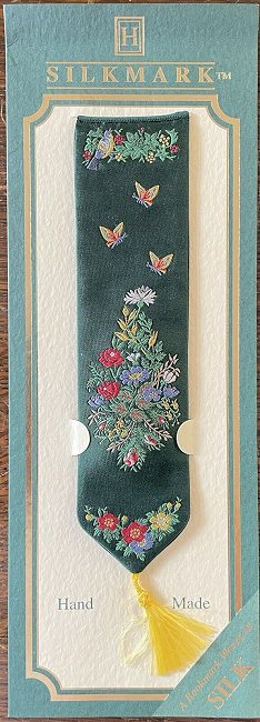 woven bookmark with no words, just pictures of butterflies & flowers