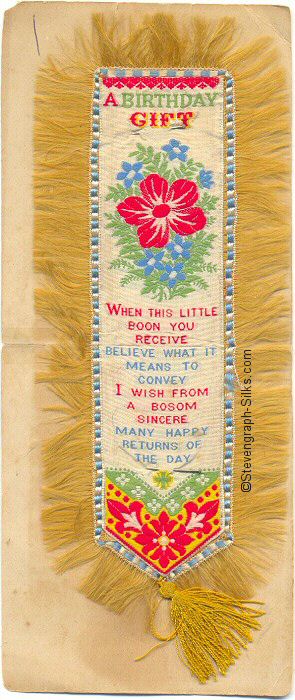 Bookmark with title words, image of flowers and words of verse, with silk fringe all around outside of bookmark
