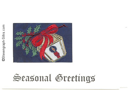 Christmas card with Seasonal Greetings and woven image of parcel and holly