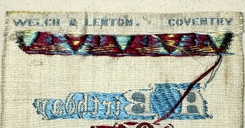 view of reverse top turnover of this bookmark, showing the Welch & Lenton woven namee