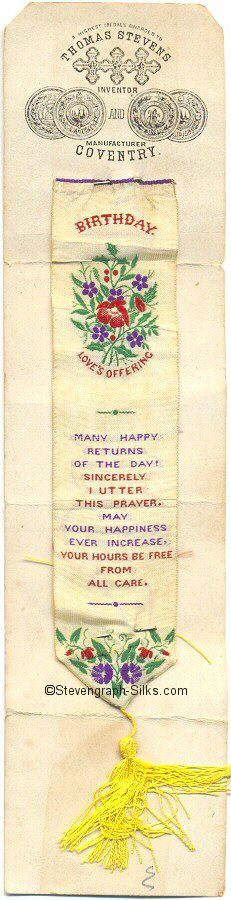 Silk bookmark, still attached to the original stiff backing paper, with title words, and words of a verse