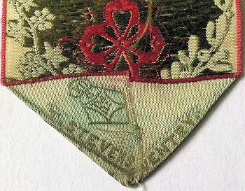 Stevens name woven on the reverse pointed end of this bookmark