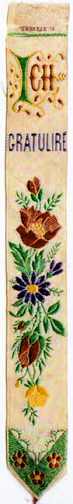 Silk bookmark with title words and image of flowers