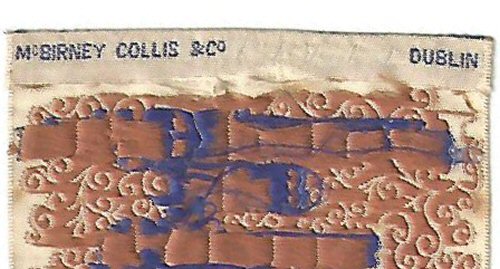McBIRNEY COLLIS & Co, DUBLIN name woven on reverse top turn over of this bookmark, despite it having been woven by Thomas Stevens