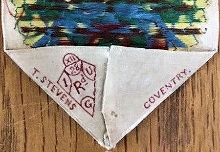 Stevens woven name and Diamond Registration mark woven on the reverse pointed end of this bookmark