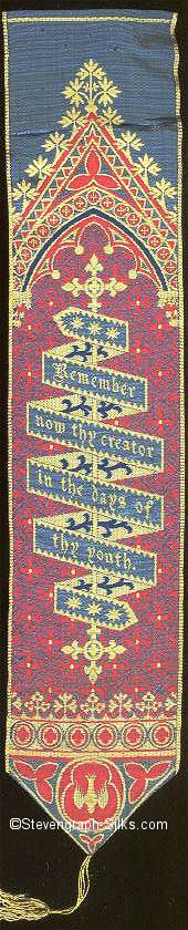 Ornate bookmark with ribbon on which are words