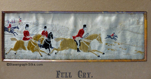 Group of horse riders and hounds chasing a fox, with lady rider wearing a red coat, instead of blue