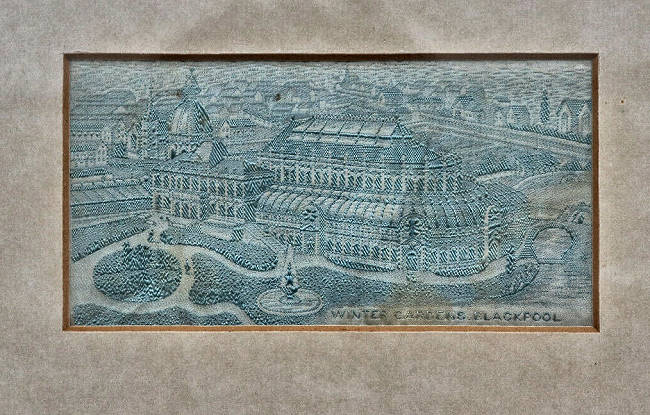 same image of Blackpool Winter Gardens pavillion, but woven in blue silk