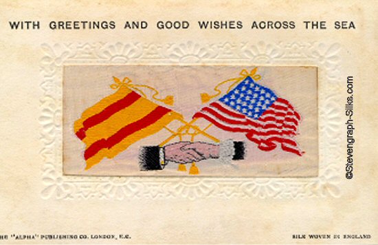 Stevens Alpha series postcard of Stevens Hands Across the Sea, with woven flags of Spain and USA