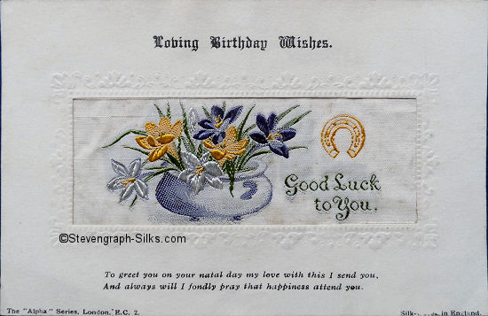 Stevens Alpha series postcard with bowl of flowers and horseshoe, and words Good Luck to You woven in silk
