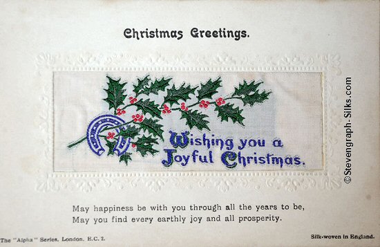 Alpha series postcard with woven WISHING YOU A JOYFUL CHRISTMAS words, printed title and words below silk