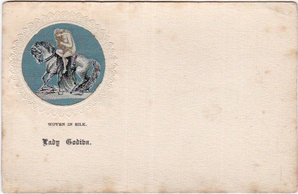 Small silk of Lady Godiva statue riding horseback, mounted on a postcard