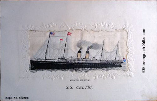 Ocean liner at anchor, with two funnels and four masts, and rigging between masts