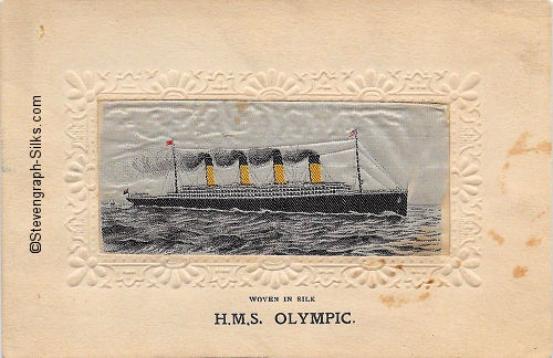 Ocean liner steaming right with four funnels and two masts