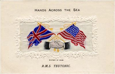 Hands Across the Sea postcard, with USA style embossing on frame round silk