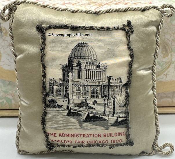 pin cushion with title words and image of the administration building at the World's Fair