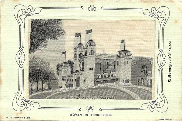 Black and white silk image of Exhibition building, with flags on flagpoles