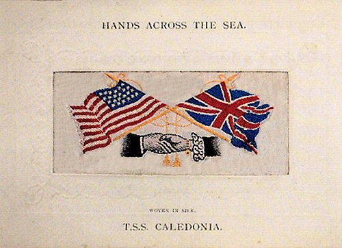 woven image of USA and British flags, with Hands Across the Sea printed above silk, and ships name printed below silk