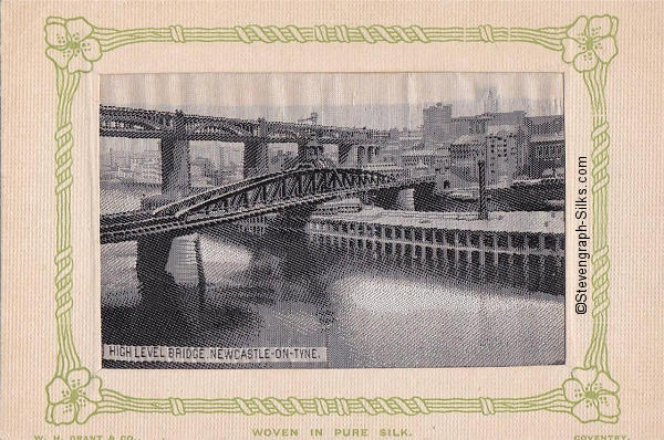 postcard woven in black and white silk, of bridge over river in Newcastle-on-Tyne