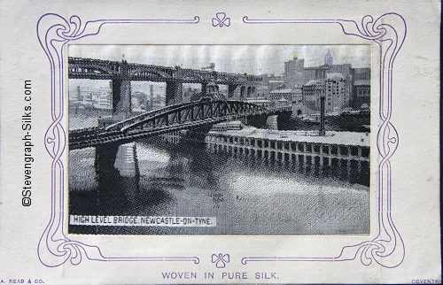 postcard woven in black and white silk, of bridge over river in Newcastle-on-Tyne