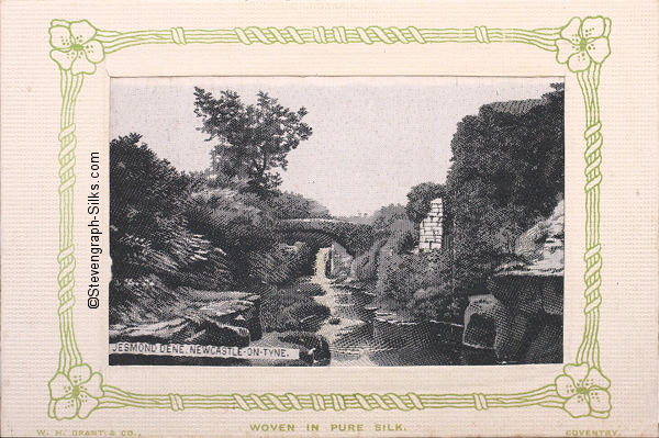 black and white image of river flowing through rocky scenery