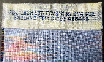 Cash's logo woven on the reverse top turnover of this bookmark