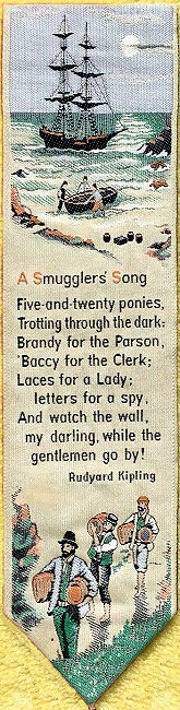 J & J Cash woven bookmark with image of an old sailing boat and men on beach, together with words of a Kipling verse