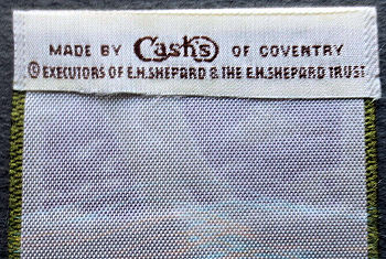 woven J & J Cash name on reverse top turnover of this bookmark