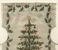 close up of top holly decoration of the earlier version of this bookmark