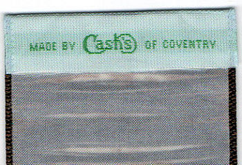 woven name of Cash's on the reverse top turnover of this bookmark