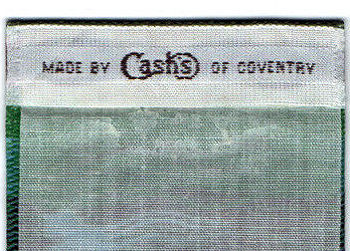 woven name of Cash's on the reverse top turnover of this bookmark