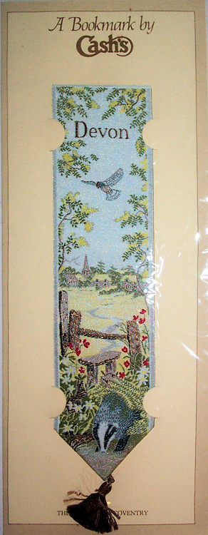 J & J Cash woven bookmark, with title words and image of nature scene