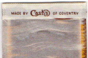 J & J Cash woven name and logo on the reverse top turn over of this bookmark