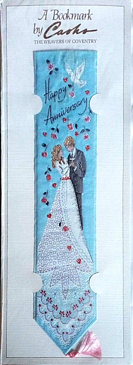 Cash's woven bookmark with woven title words and image of a married couple