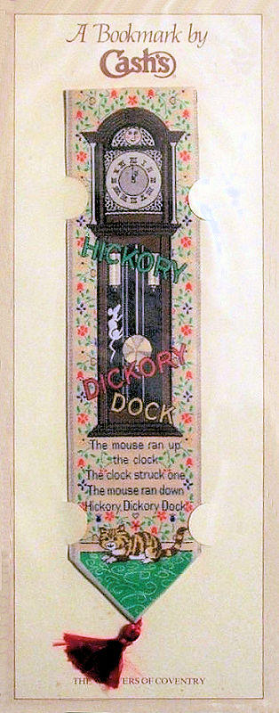 J & J Cash woven bookmark, with words, and image of a grand-father clock and mouse