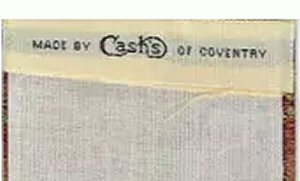 woven name of Cash's on the reverse top turnover of this bookmark