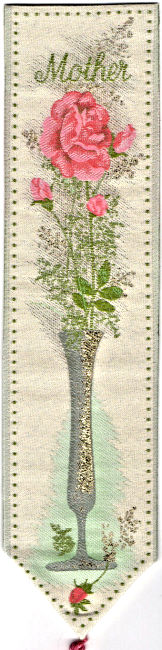 Cash's woven bookmark with woven title word and image of a pink rose in a vase