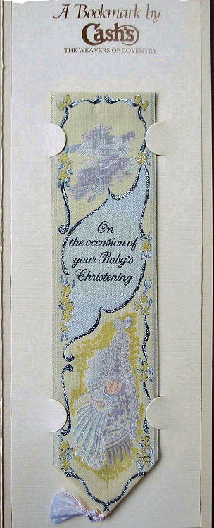 Cash's woven bookmark with image of a baby's crib and title words