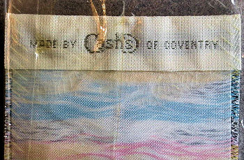reverse view of this bookmark, with CASH'S woven name