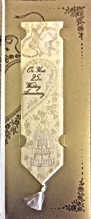 J & J Cash woven bookmark, with title words, image of a dove and wedding cake