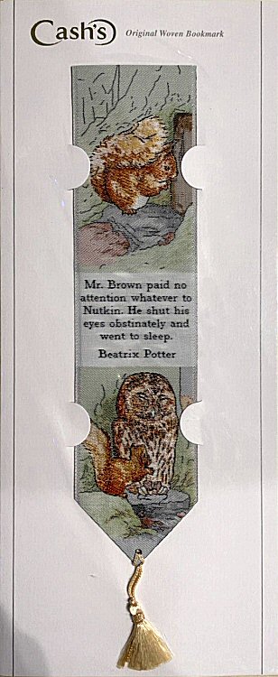 Cash's woven bookmark of Squirrel Nutkin, and words: Mr Brown paid no attention