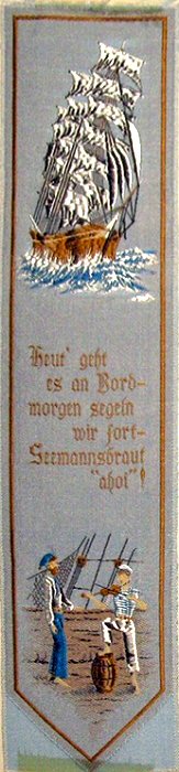 Cash's woven bookmark with woven title words in German, and words of a poem