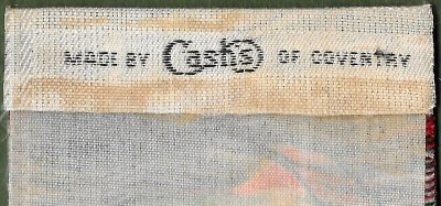 Cash's woven name on the reverse pointed end of this bookmark